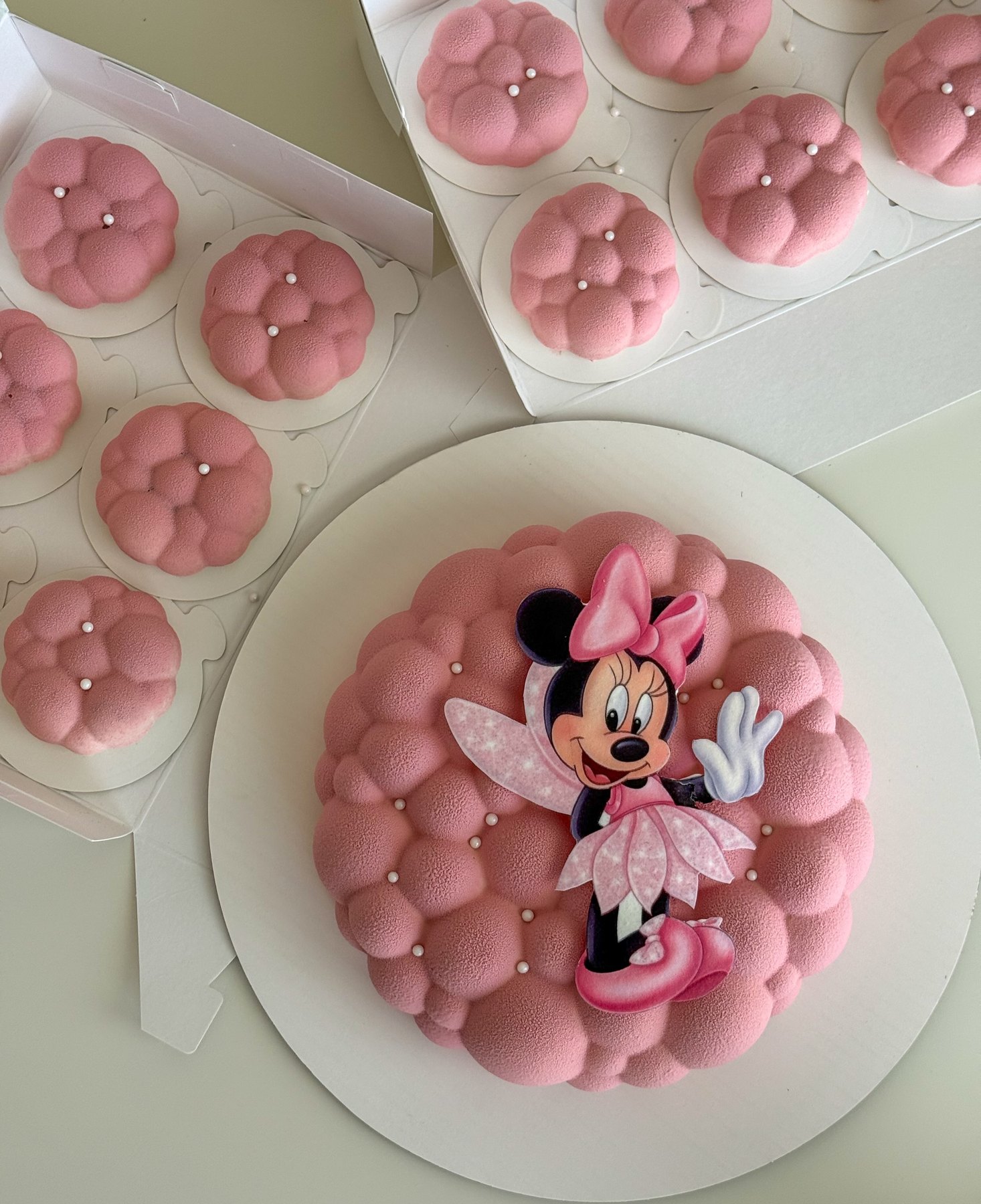 pink character mousse cake for a child birthday